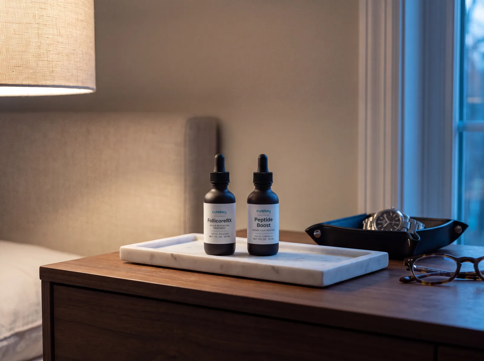 FollicoreRX and Peptide Boost on a bedside table at dusk