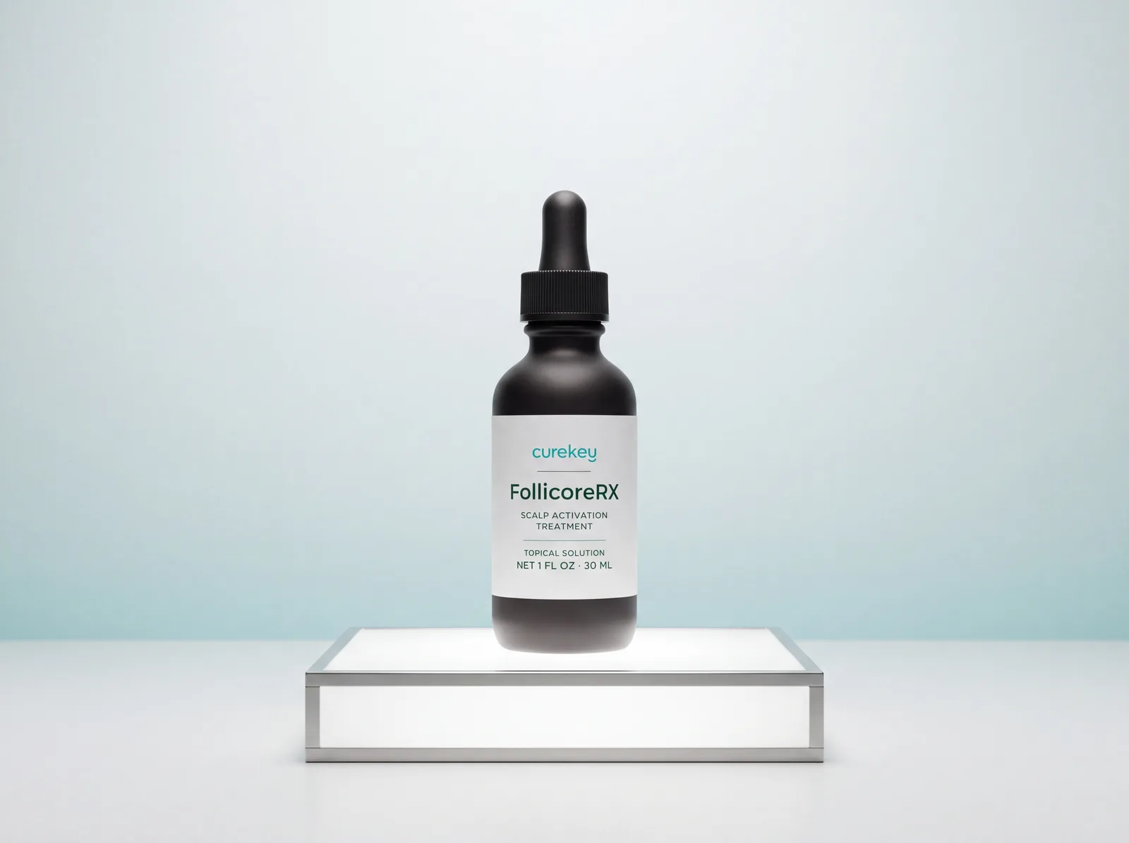 FollicoreRX on a glass stand in soft light