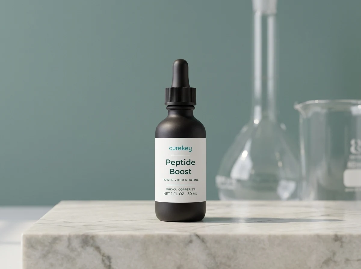 Peptide Boost copper peptide topical on a marble block with laboratory glassware behind